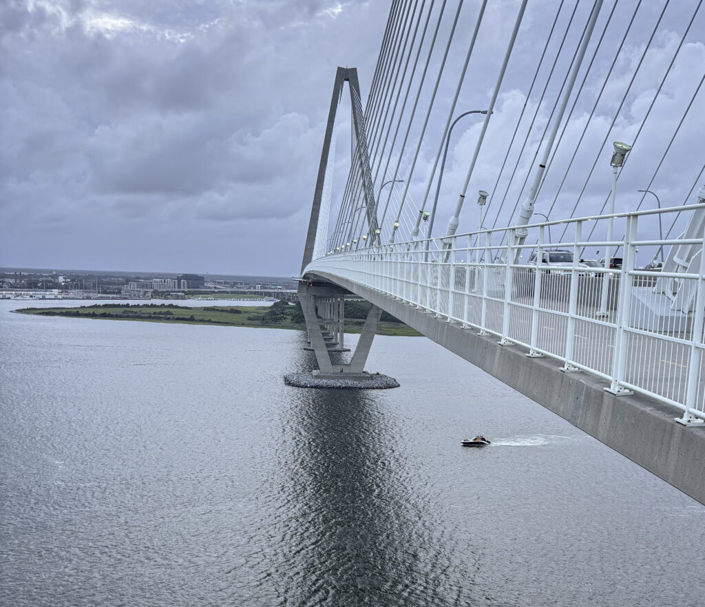 The top of the Arthur Ravenel Jr. Bridge looking out into Charleston Bay.