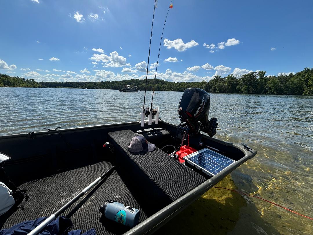 A picture of a 12-foot jon boat in flatwater conditions.